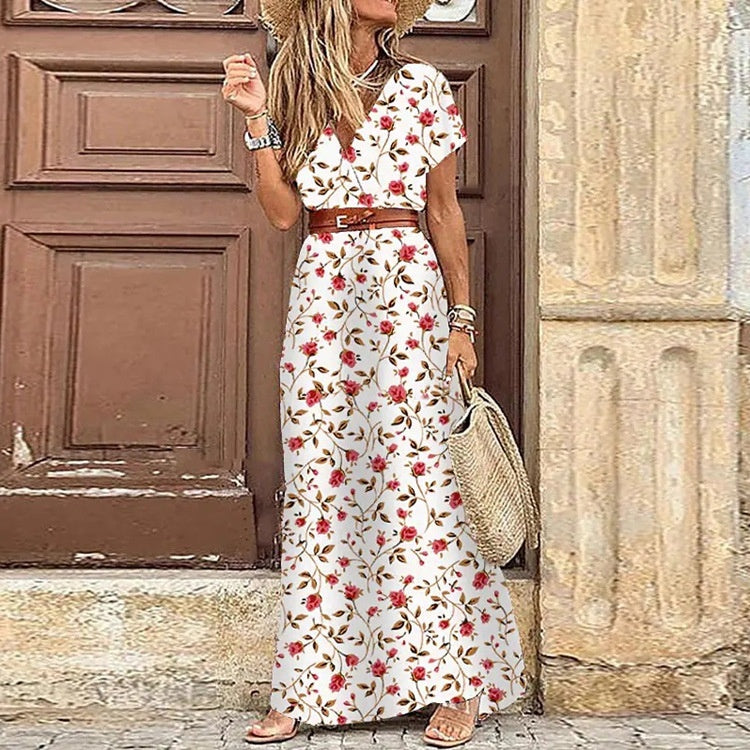 Boho maxi dress in white with red floral print, short sleeves and tied waist belt