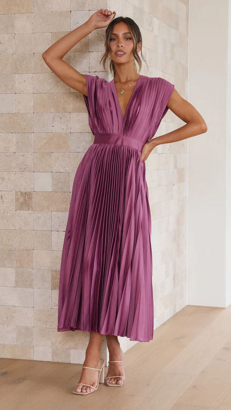 Purple pleated maxi dress with V-neck, gathered waist, and short puff sleeves