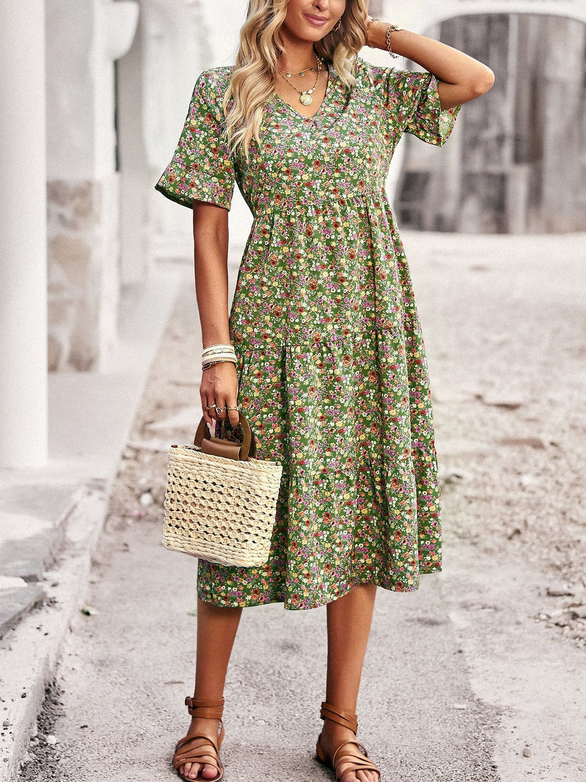 Floral V-neck midi dress in green with short puff sleeves and gathered waist