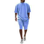 Light blue relaxed summer set: short-sleeve T-shirt and knee-length shorts