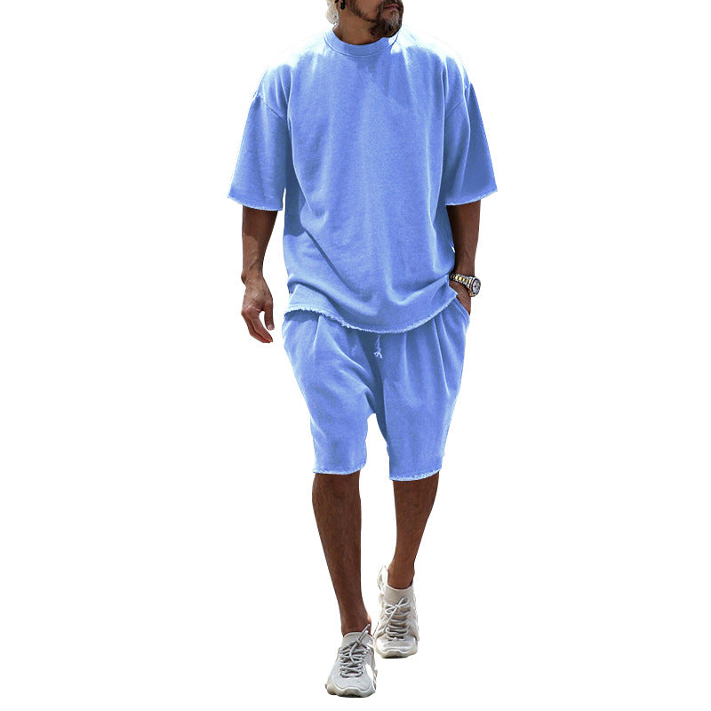 Light blue relaxed summer set: short-sleeve T-shirt and knee-length shorts