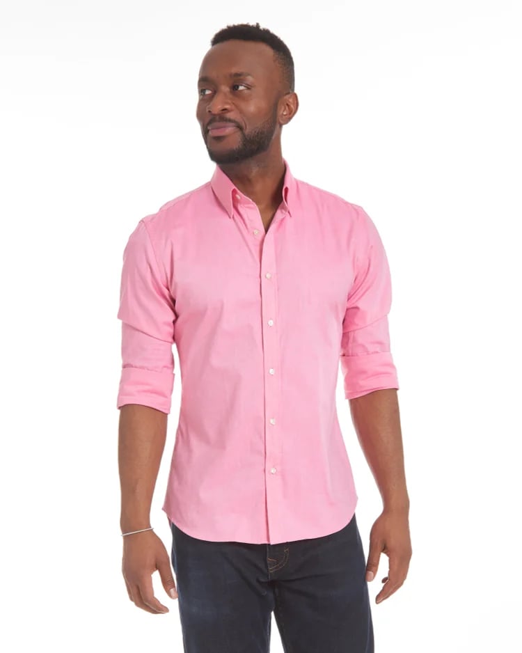 Pink stretch zip shirt with point collar, button-front, long sleeves on model