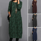 Long-sleeve maxi dress, round neckline, dark green patterned fabric, loose fit
