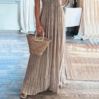 Light gray halter maxi dress, sleeveless, vertical pleated texture, flowing fit