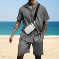 Gray short-sleeve button-up shirt and matching shorts with crossbody bag