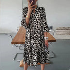 Leopard-print women's midi dress with long sleeves and round neckline