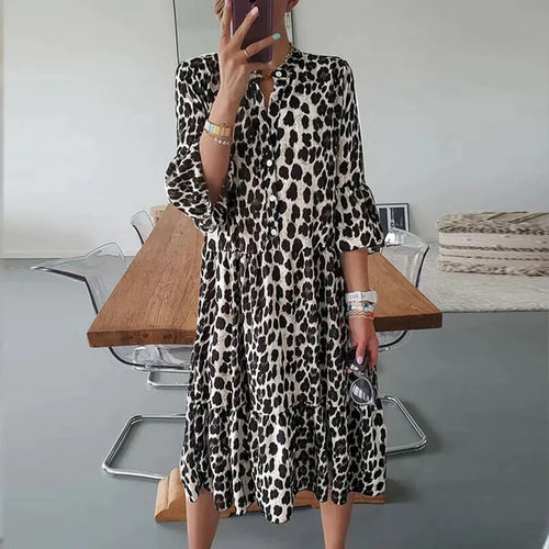 Leopard-print women's midi dress with long sleeves and round neckline