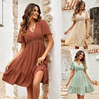 Brick red short-sleeve V-neck tiered dress with small dot pattern and textured yoke