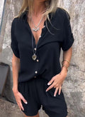 Laurine™ linen set in black: short-sleeve button-up shirt and matching pocketed shorts