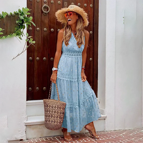 Sleeveless tiered boho dress with V-neck and crochet trim, light blue with small print