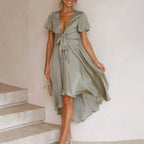 MINNA olive summer dress with V-neck, short sleeves, tie front and high-low hem