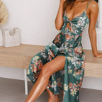 Georgette dress in dark green with floral print, spaghetti straps, bow-tied bust, V neckline