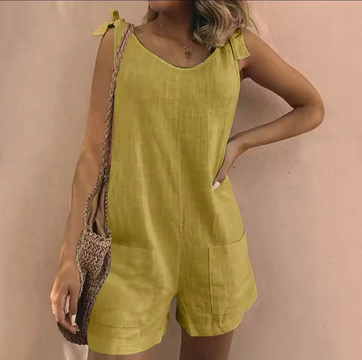 Sofia™ elegant yellow sleeveless romper with scoop neck and side pockets, short legs