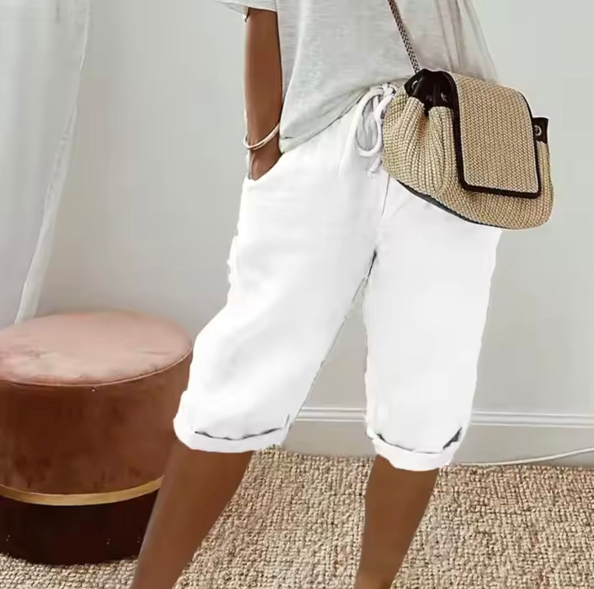 White cropped womens pants with drawstring waist and relaxed cuffed hem