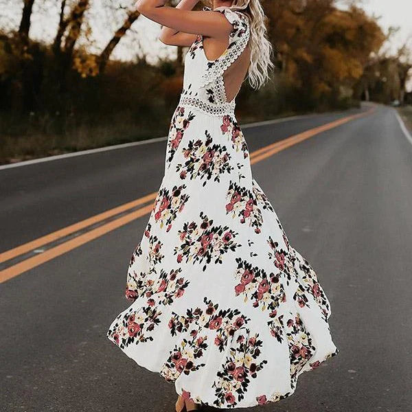 White floral sleeveless dress with crochet lace trim, tiered maxi skirt