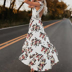 White floral sleeveless dress with crochet lace trim, tiered maxi skirt