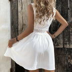 White sleeveless elegant mini dress with lace-trim bodice and flared skirt