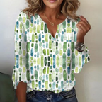 Women's airy blouse with green-blue-and-white abstract pattern and V-neck
