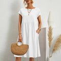 White short-sleeve tiered midi dress with crew neck and gathered waist