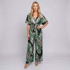 Tropical maxi dress with V-neck and loose fit, green leaf print on dark base