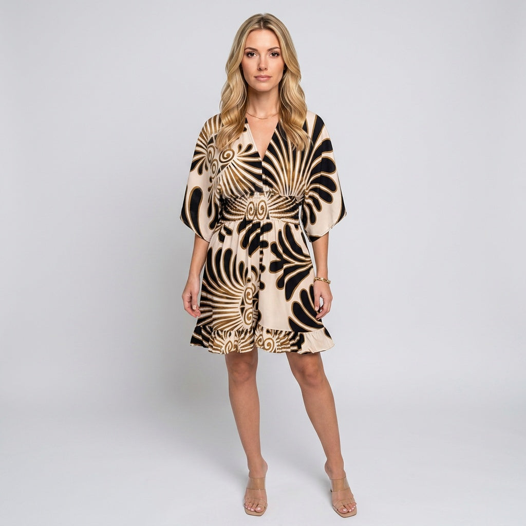 Brown and black printed tunic dress with V-neck and loose, knee-length cut