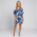 Blue printed tunic dress with V-neck, loose fit, and batwing sleeves