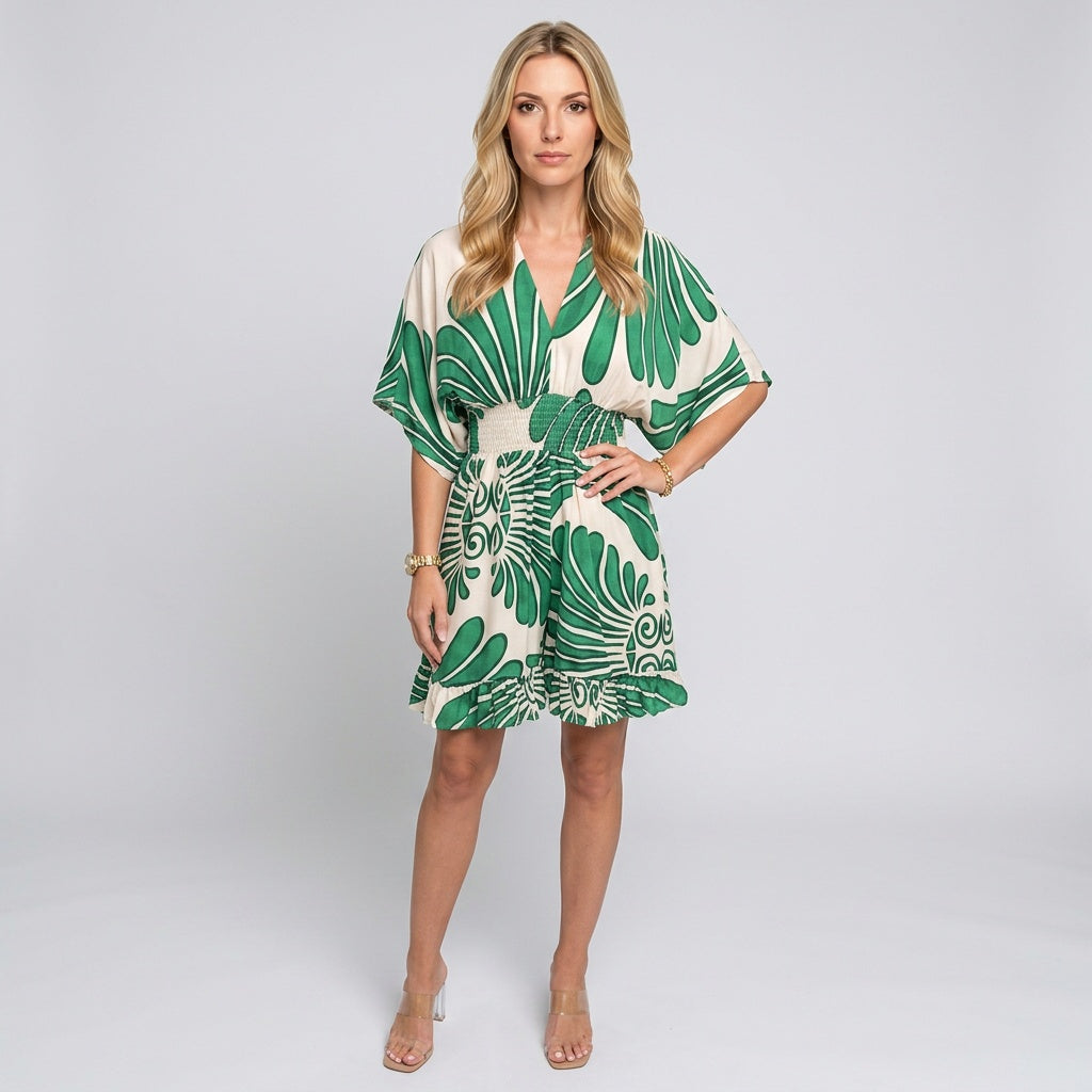 Green printed tunic dress with V-neck, loose fit, and batwing sleeves