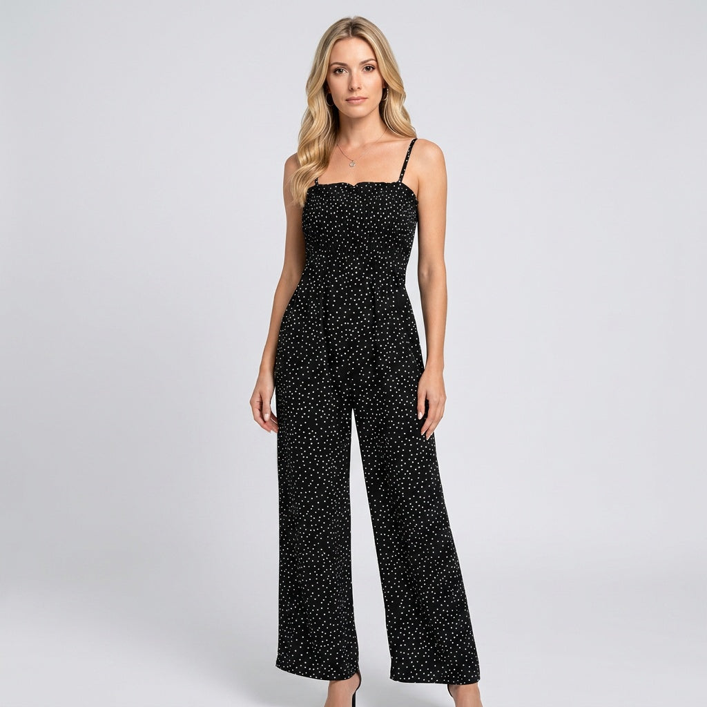 Black glitter strapless jumpsuit with wide legs and thin spaghetti straps