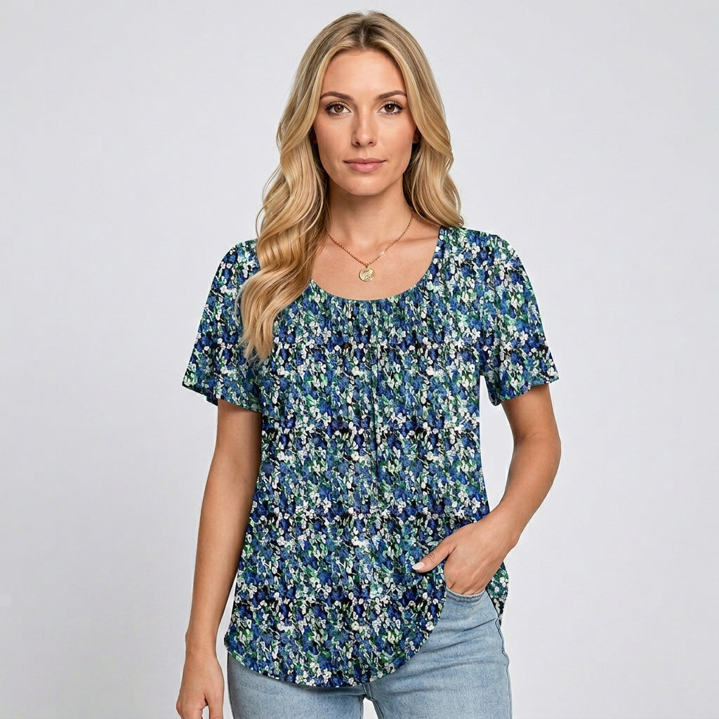 Loose-fit crewneck T-shirt, blue floral print with short sleeves and front pleats