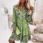 Floral print party dress with long sleeves and V-neck, tiered skirt in green tones