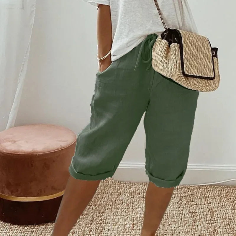 Green cropped womens pants with drawstring waist and relaxed cuffed hem