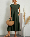 Ruby summer dress in dark green, tiered midi with short sleeves and scoop neckline