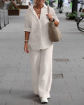 Nellie™ cotton set in light beige: short-sleeve button shirt, wide-leg trousers.