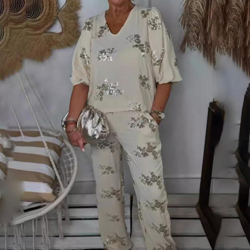 Lynn Comfortable set in light cream with silver sequined floral accents, V-neck blouse and trousers
