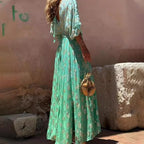 Bohemian maxi dress with V-neck, turquoise floral print, side view, three-quarter sleeves