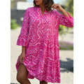 Women's summer dress in fuchsia pink with bold geometric print and tiered ruffle hem