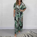Tropical maxi dress with V-neck and loose fit, green and dark leaf print