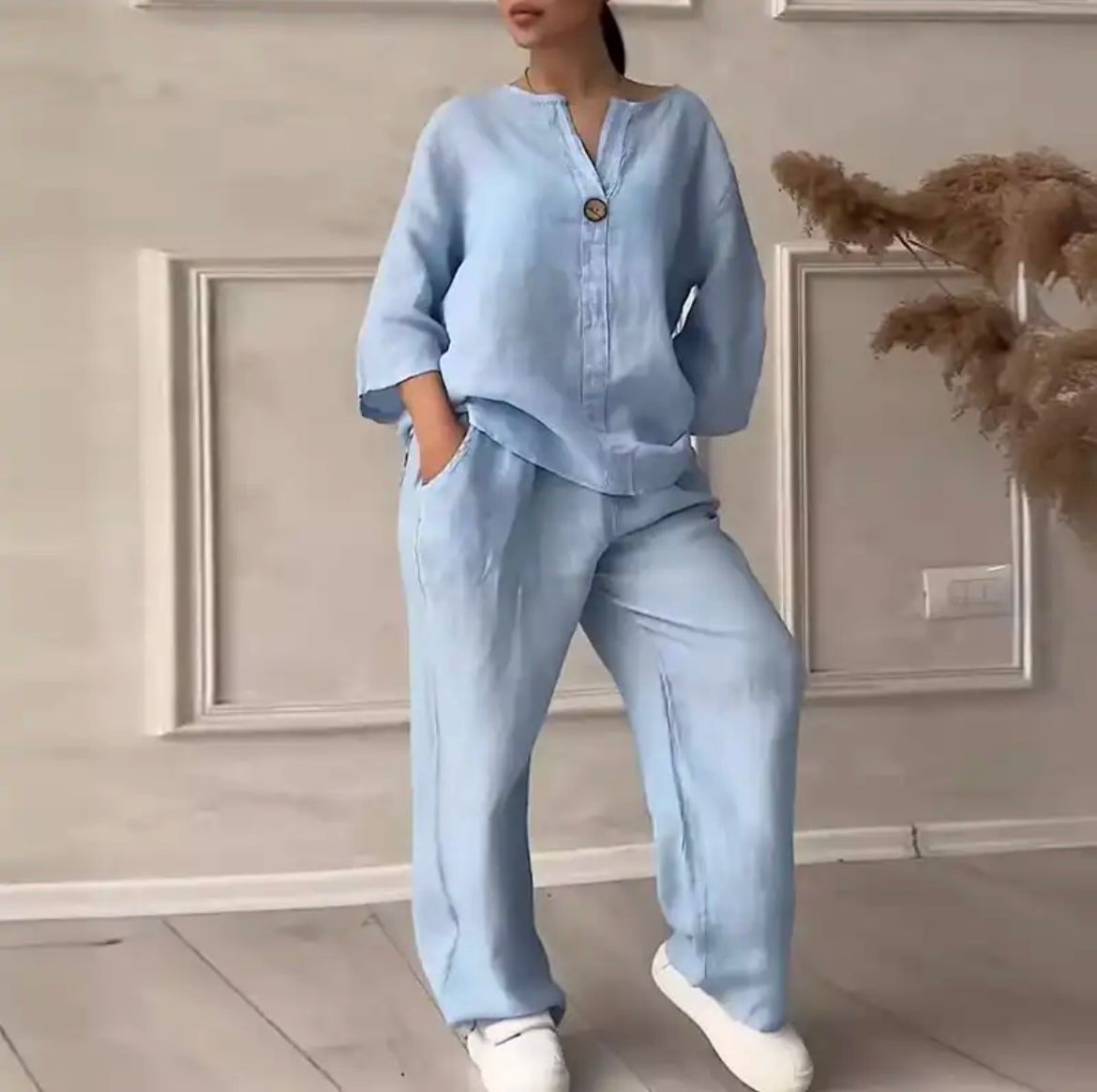 Light blue linen set with short-sleeve button top and wide-leg pants