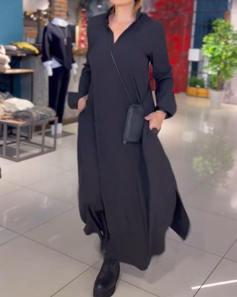 Black V-neck maxi dress with three-quarter sleeves and wrap-style waist.