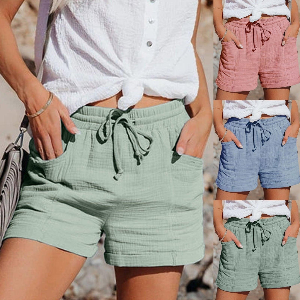 Mint green cotton shorts with elastic waistband and drawstring