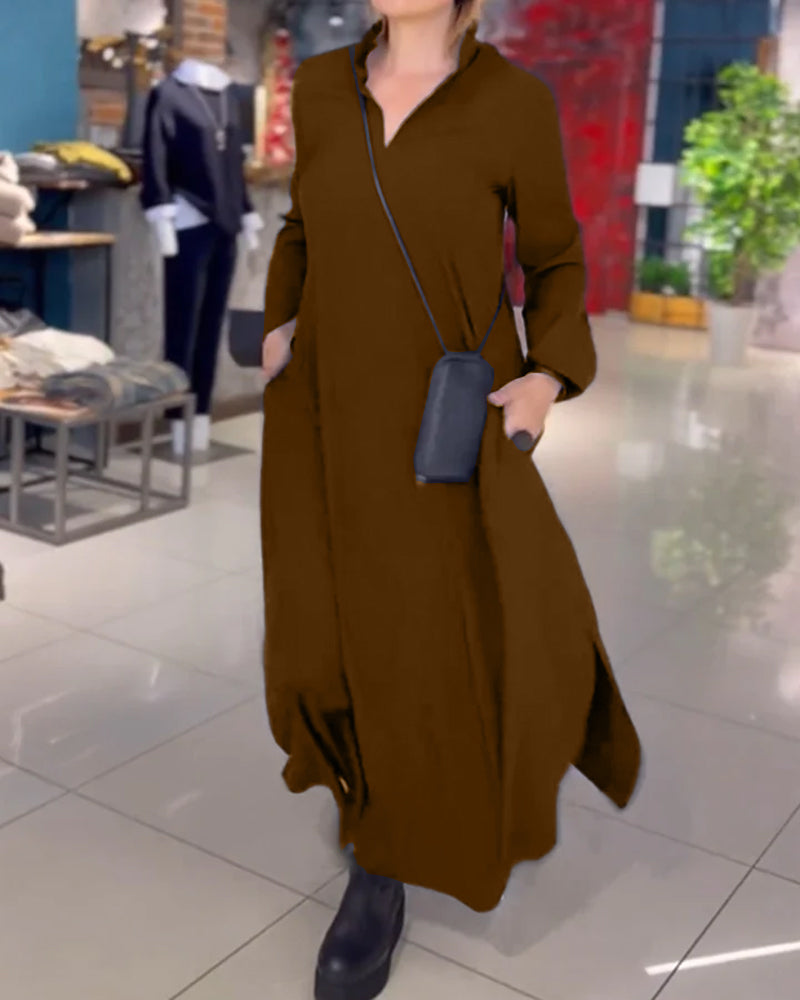 Brown V-neck maxi dress with three-quarter sleeves and wrap-style waist.