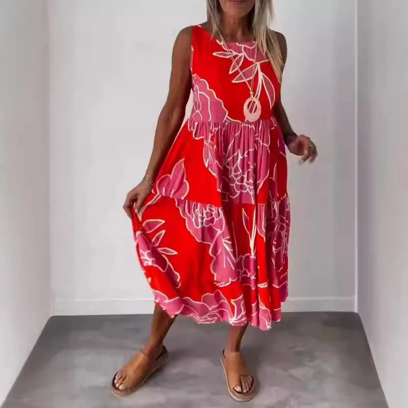 Sleeveless printed midi dress with round neckline and flowing tiered skirt, red with white.