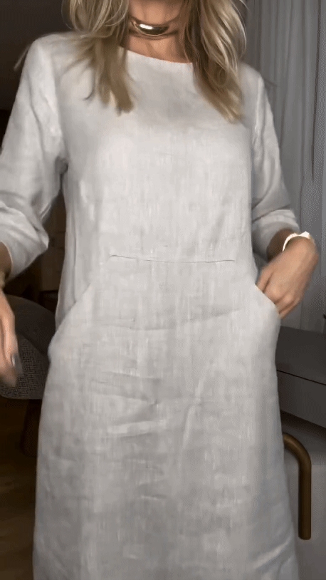 Merel™ white summer dress, loose midi design with long sleeves and patch pockets at chest