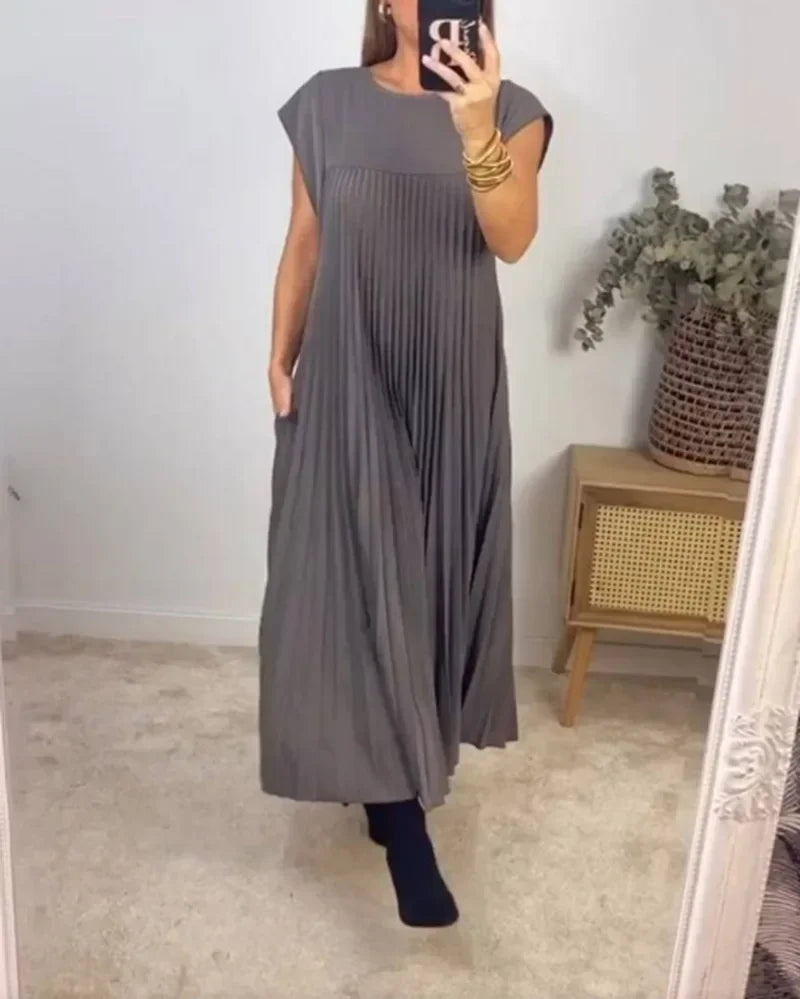 Grey pleated maxi dress with cap sleeves and ankle-length hem