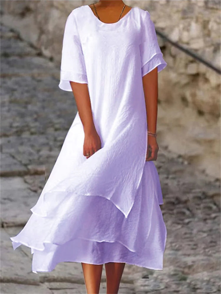 Lavender long midi dress with short sleeves, round neck, and layered ruffle hem