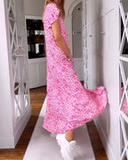 Pink leopard-print V-neck maxi dress with ruffled cap sleeves and flared hem
