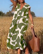 Green and white abstract print V-neck cap-sleeve maxi dress