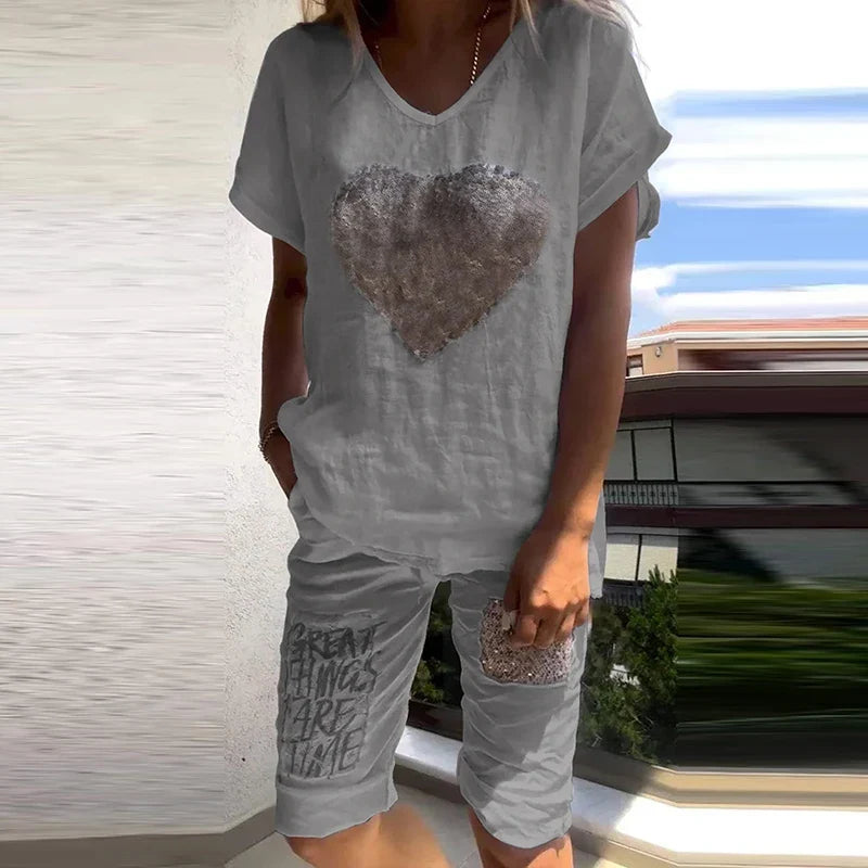 Gray V-neck T-shirt and shorts set with dark heart and text print