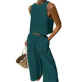 Two-piece sleeveless crop top and wide-leg pants set, teal with elastic waist