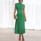 Green sleeveless midi dress with high neck and gathered pleated skirt